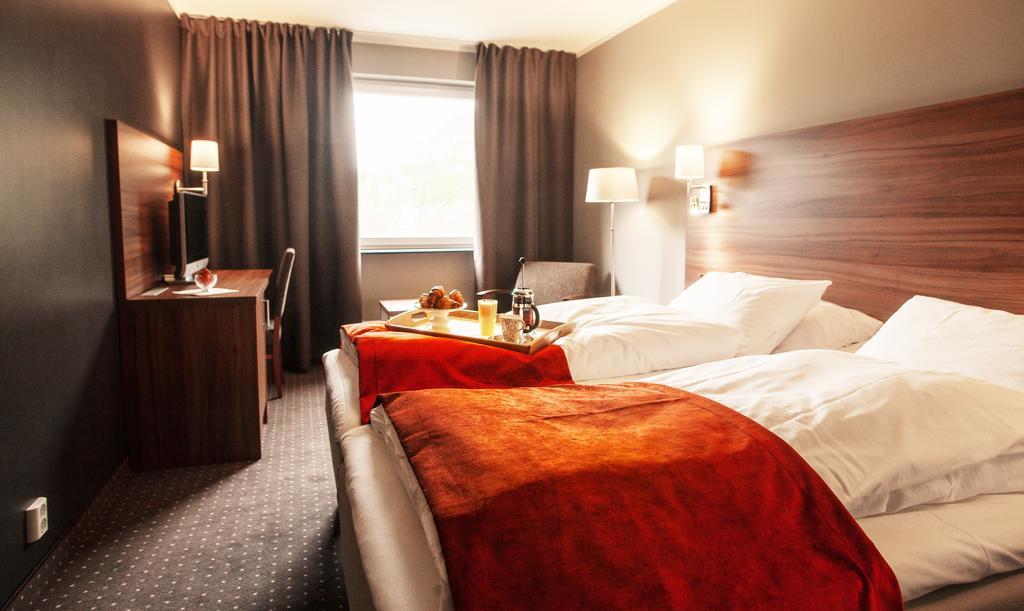 Thon Partner Hotel أوتا الغرفة الصورة